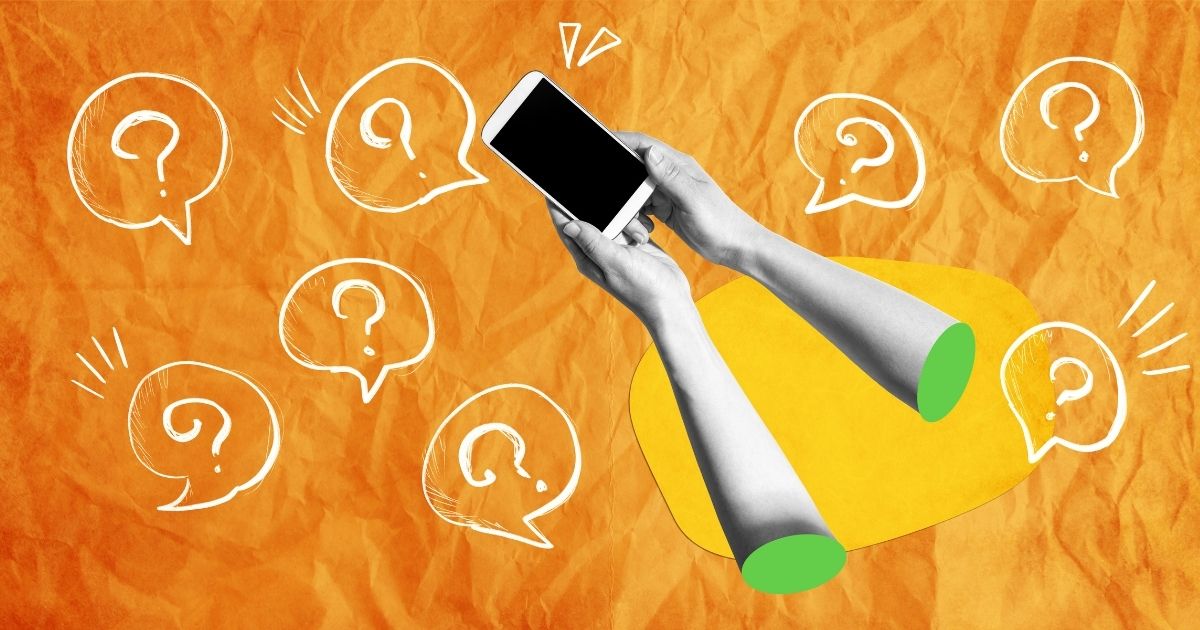 Hand holding a smartphone surrounded by question mark speech bubbles